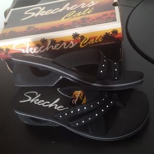 Skechers black wedges